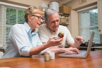 older adults checking medication labels